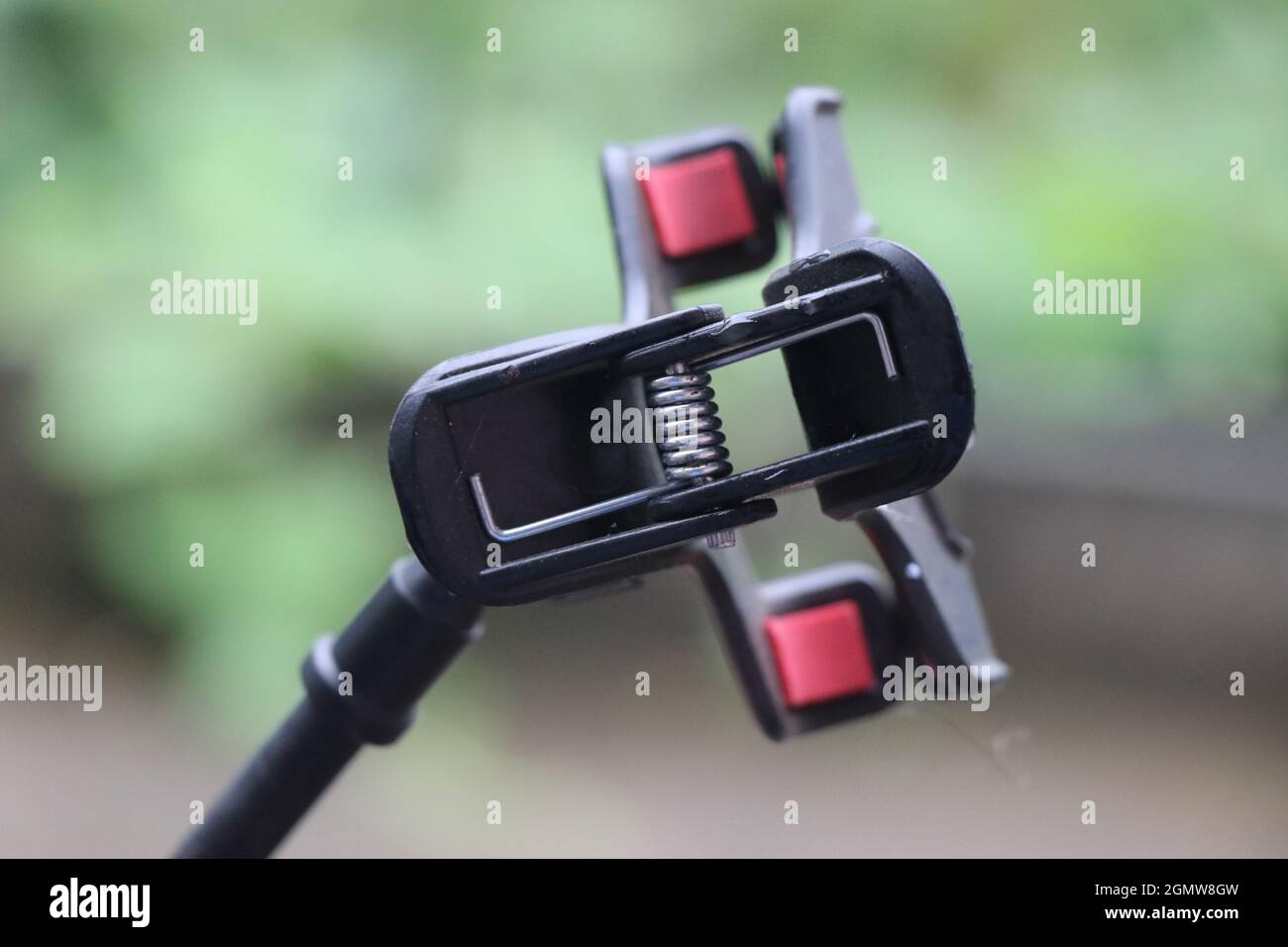 The clip part of mobile phone holder, cellphone holder for car and other automobiles close up view Stock Photo