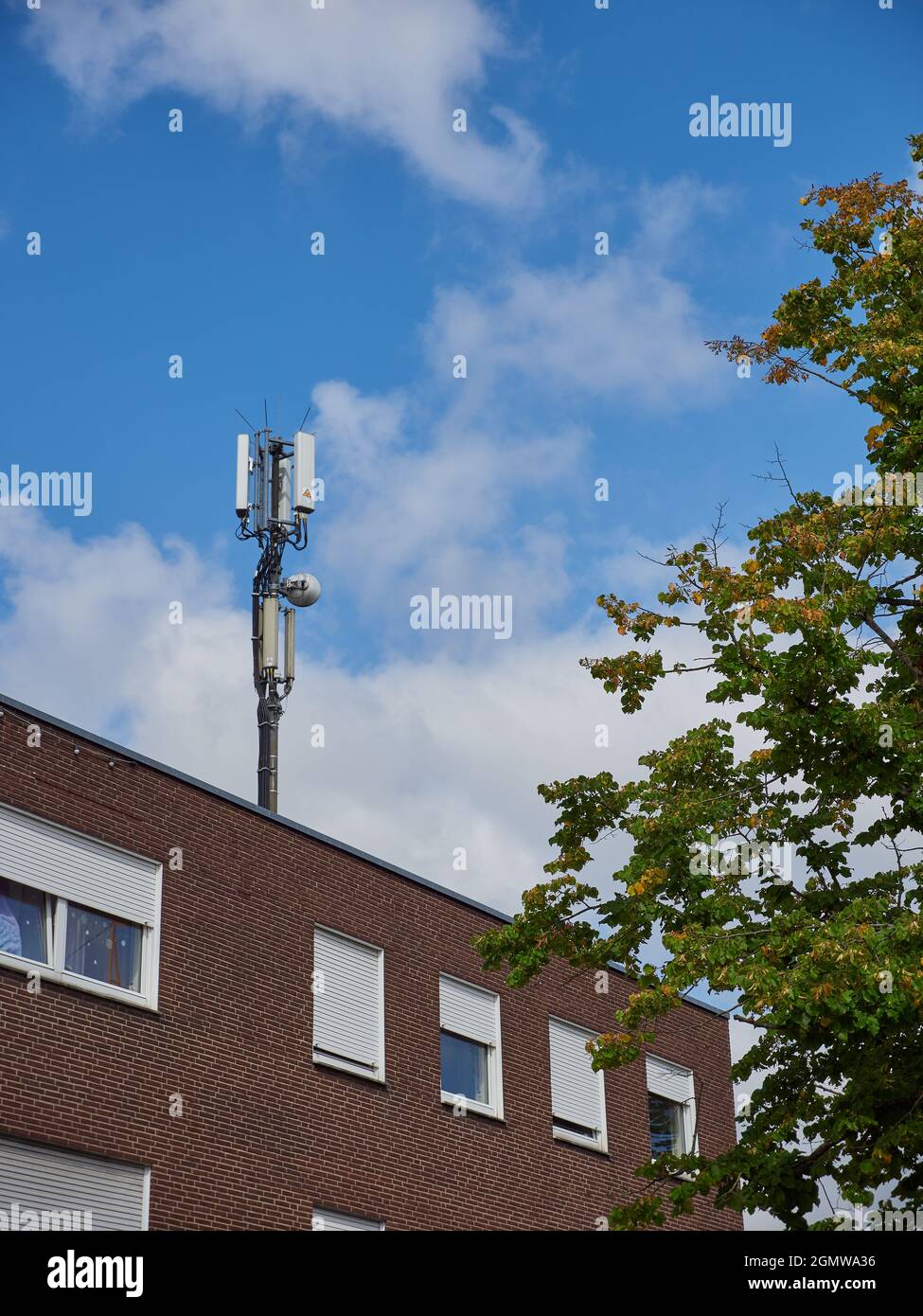 Radio mast on the roof for cell phones and G5 Stock Photo