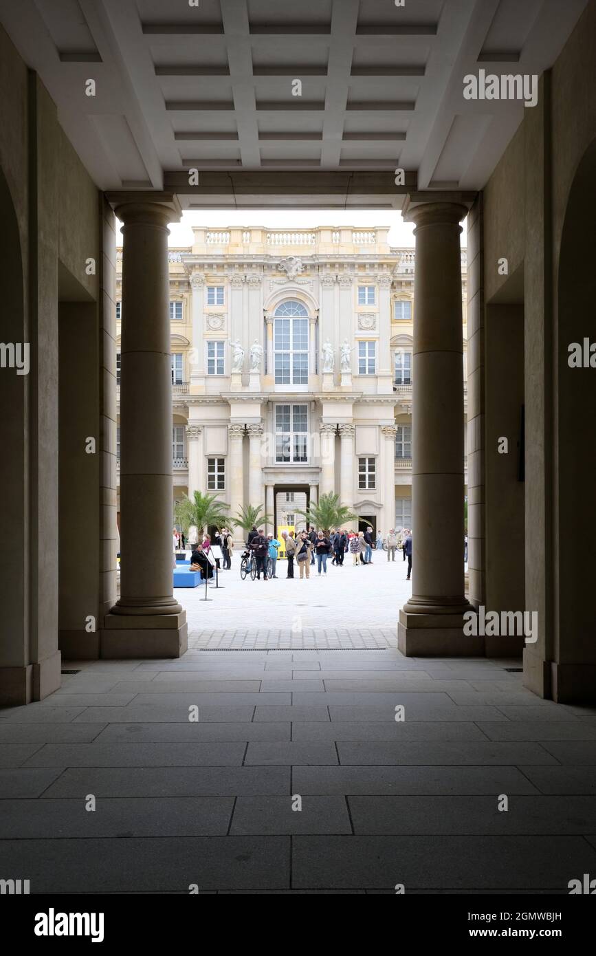 Berlin, Germany, September 17, 2021, view through a columned portal into the large courtyard of the Berlin Palace Stock Photo