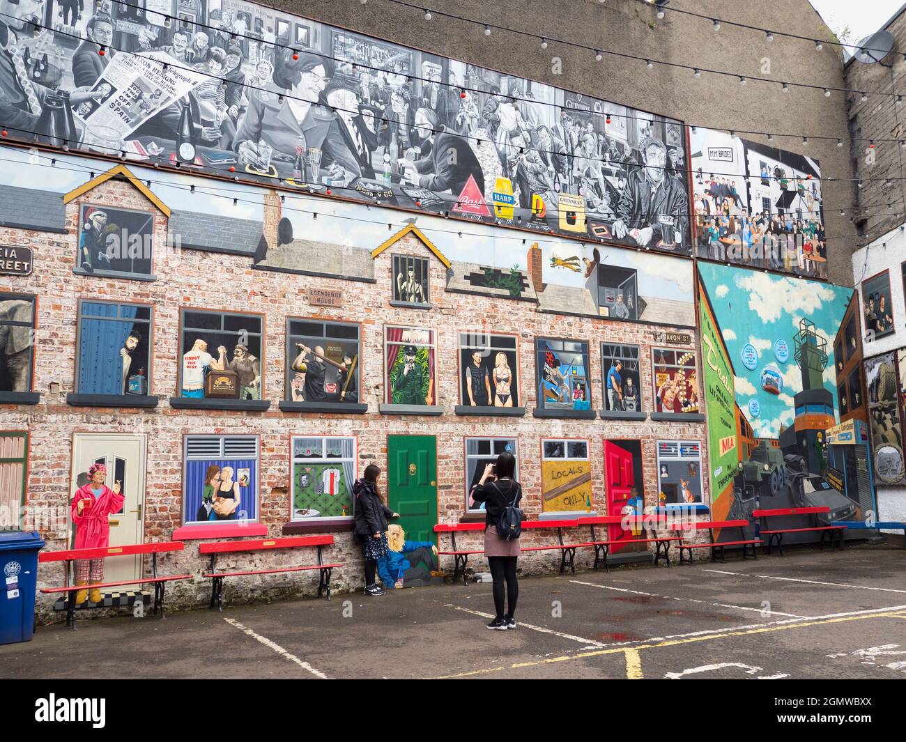 Belfast, Ulster - United Kingdom; Belfast is a city that cannot. seemingly, leave any wall untouched without a splash of colour. The graffiti, especia Stock Photo