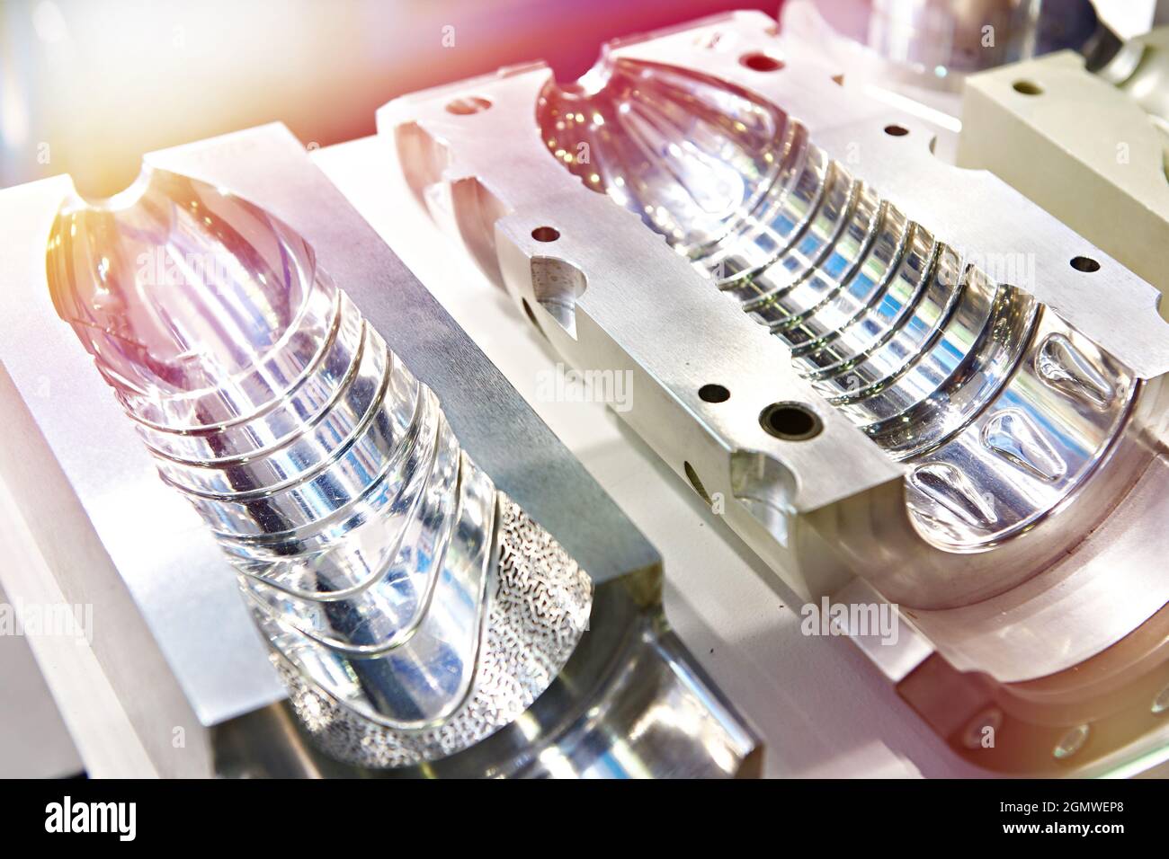 Metal molds for making plastic bottles Stock Photo