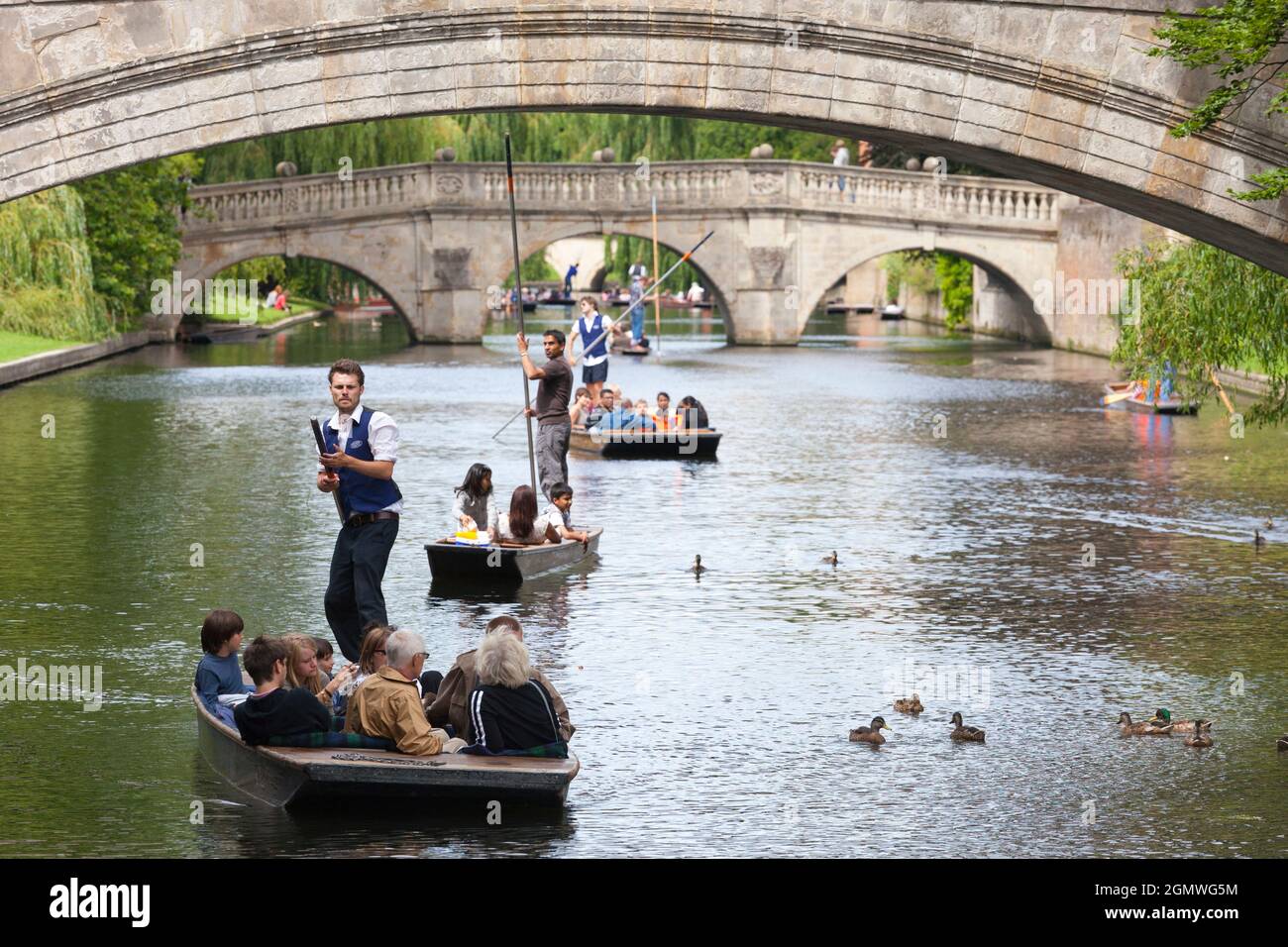Cambridge, England - 20 July 2009; many people in view. A quintessentially English pursuit on a fine summer's day -  punting on the River Cam, which r Stock Photo