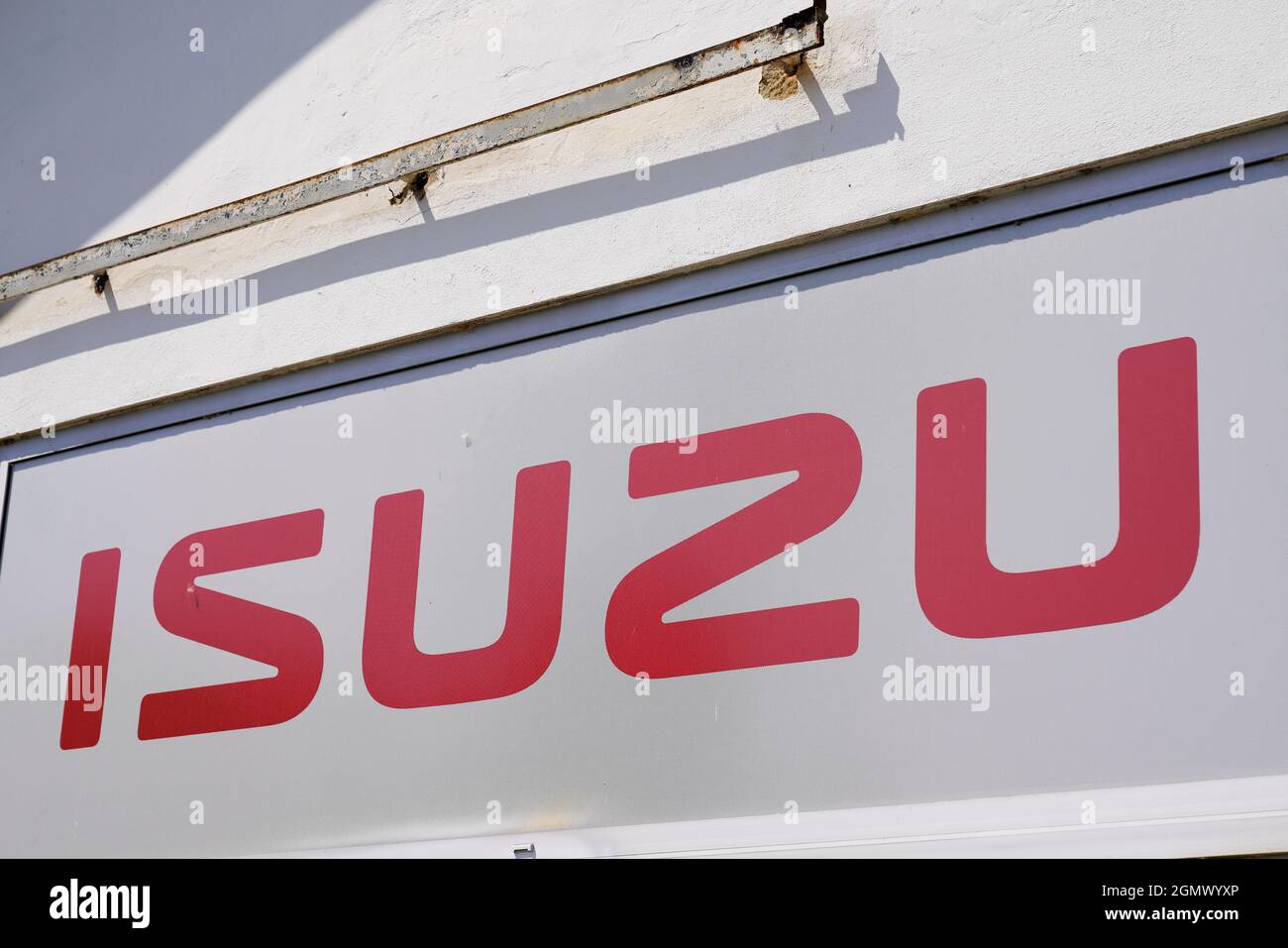 Bordeaux , Aquitaine  France - 09 05 2021 : Isuzu car truck sign logo and brand text in dealership garage station Stock Photo