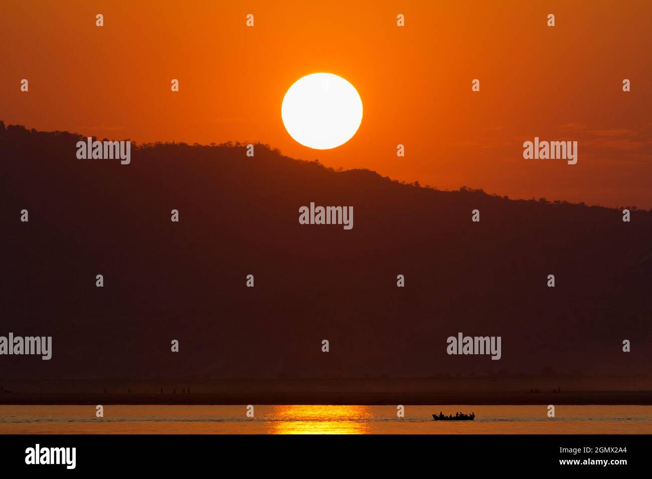 Mandalay, Myanmar - 29 January 2013. Sublime sunset over the Irrawaddy  River, viewed from Mandalay Hill. As the beloved old Kipling poem 'The Road  to Stock Photo - Alamy
