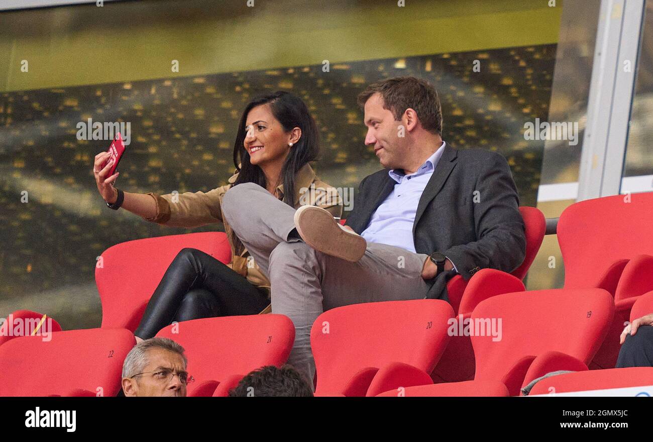 politician and fc bayern fan lars klingbeil spd with a woman in the match fc bayern muenchen vfl bochum 7 0 1 german football league on september 18 2021 in munich germany season