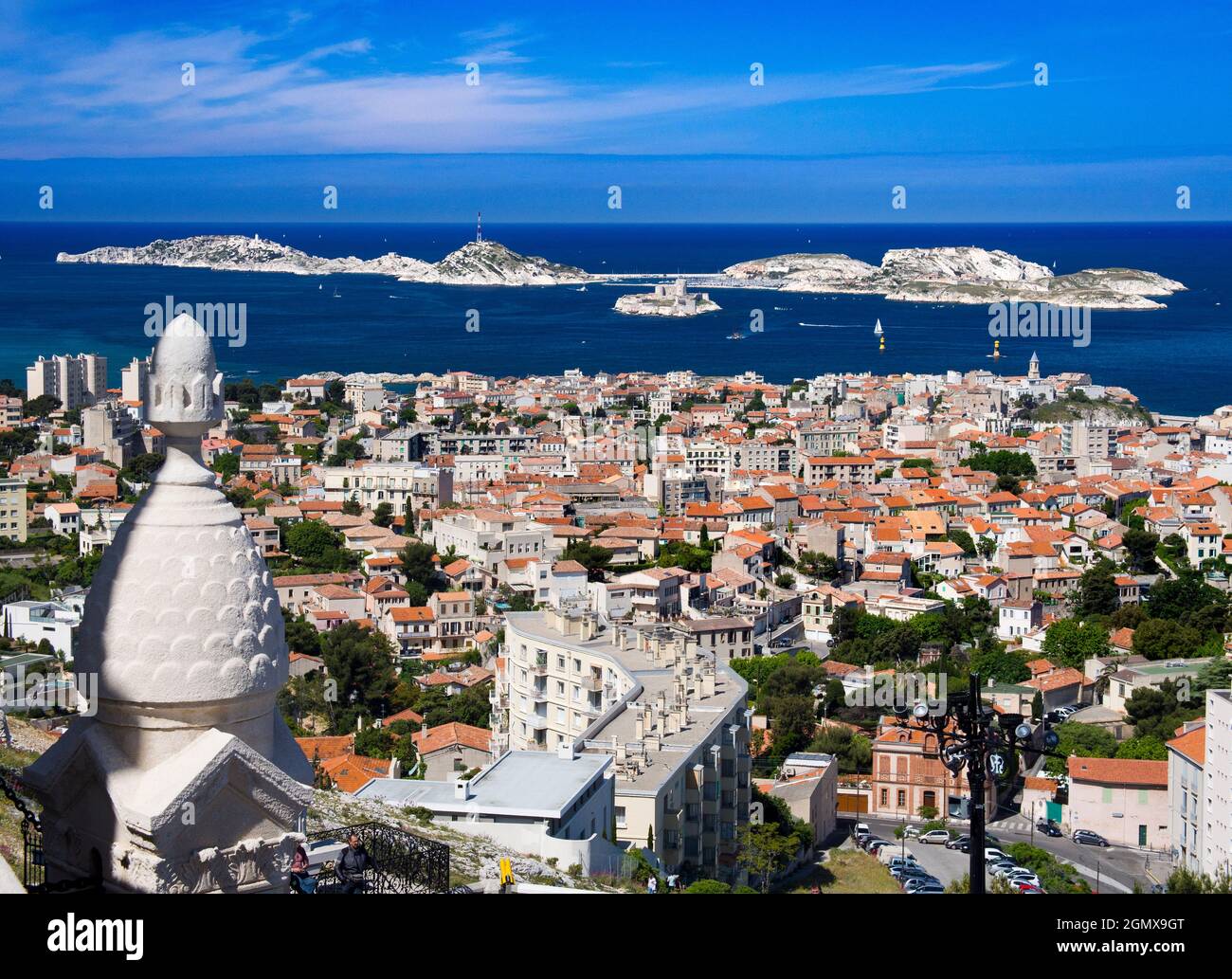 Marseilles, France - 20 June 2013; several people in view. Notre-Dame de la Garde (Our Lady of the Guard), is a Catholic basilica in Marseille, France Stock Photo