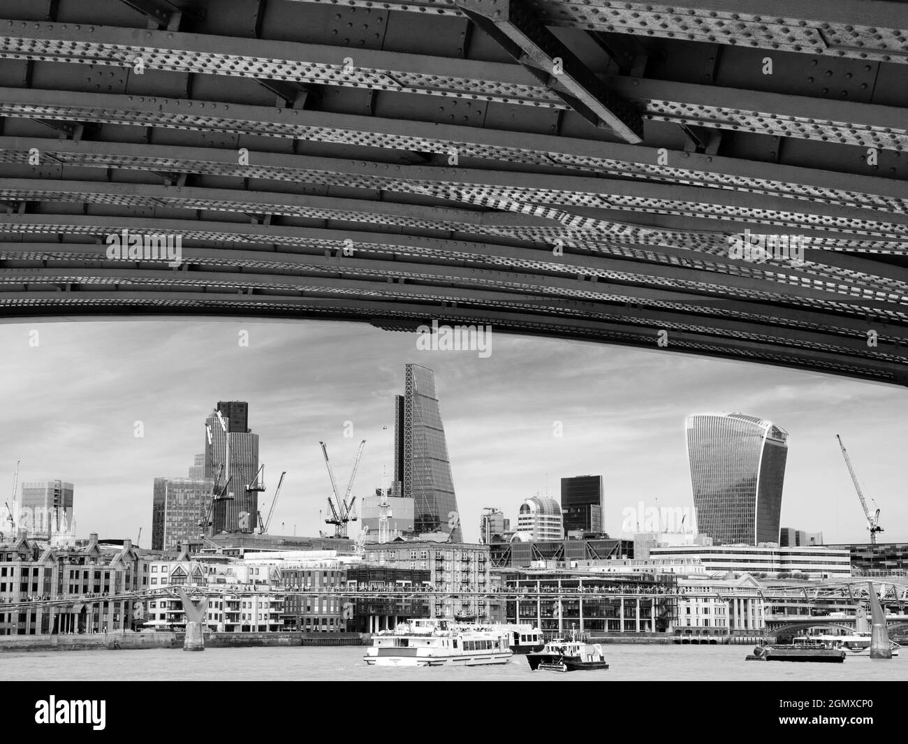 The City of London is a global financial centre; its skyline has changed dramatically over recent years. Londoners have nicknamed many of the new skys Stock Photo