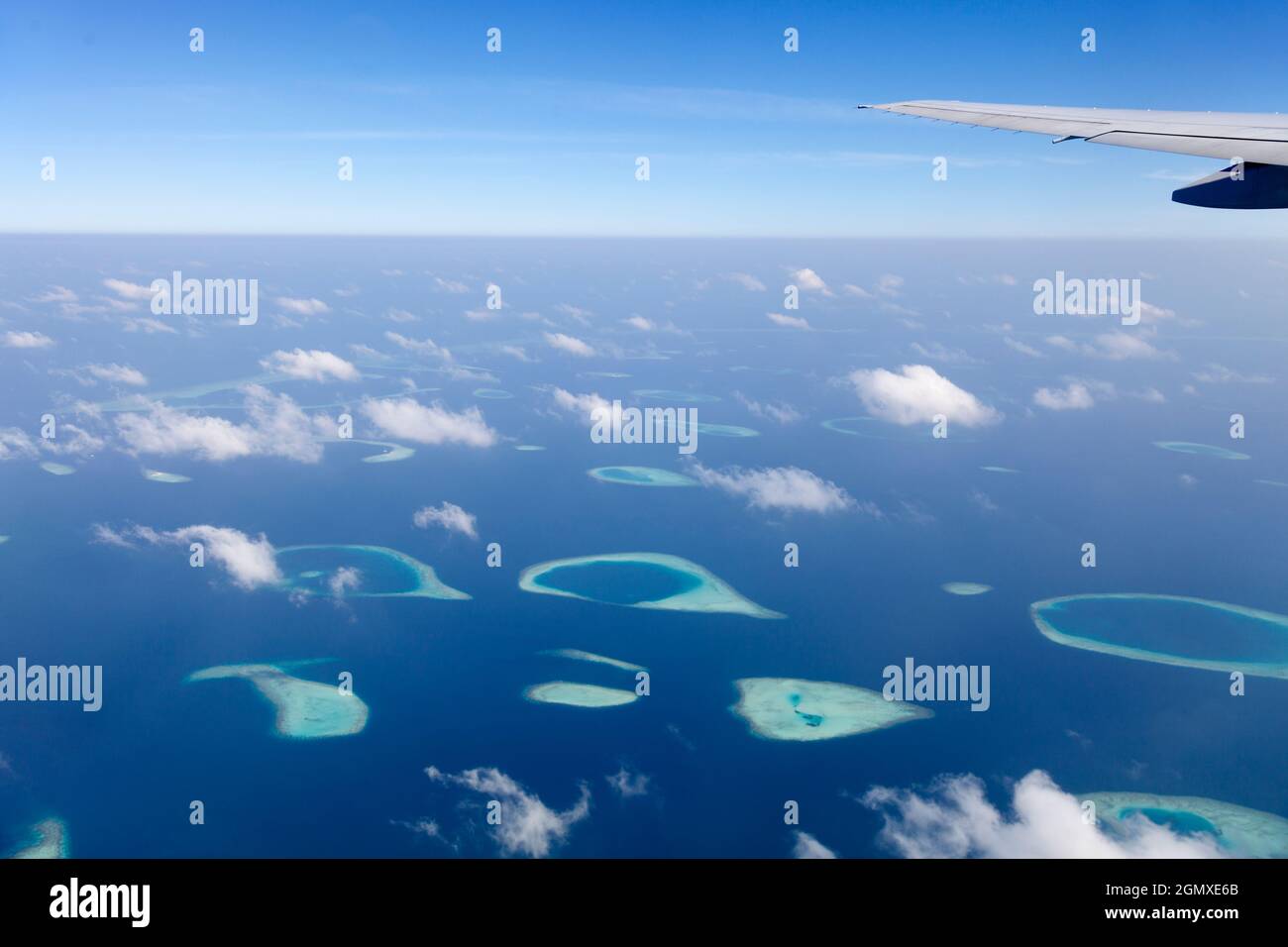 Maldives, Indian Ocean - 8 February 2014; View from the window of an airplane flying above the Maldives in the Indian Ocean. The Maldives is an idylli Stock Photo