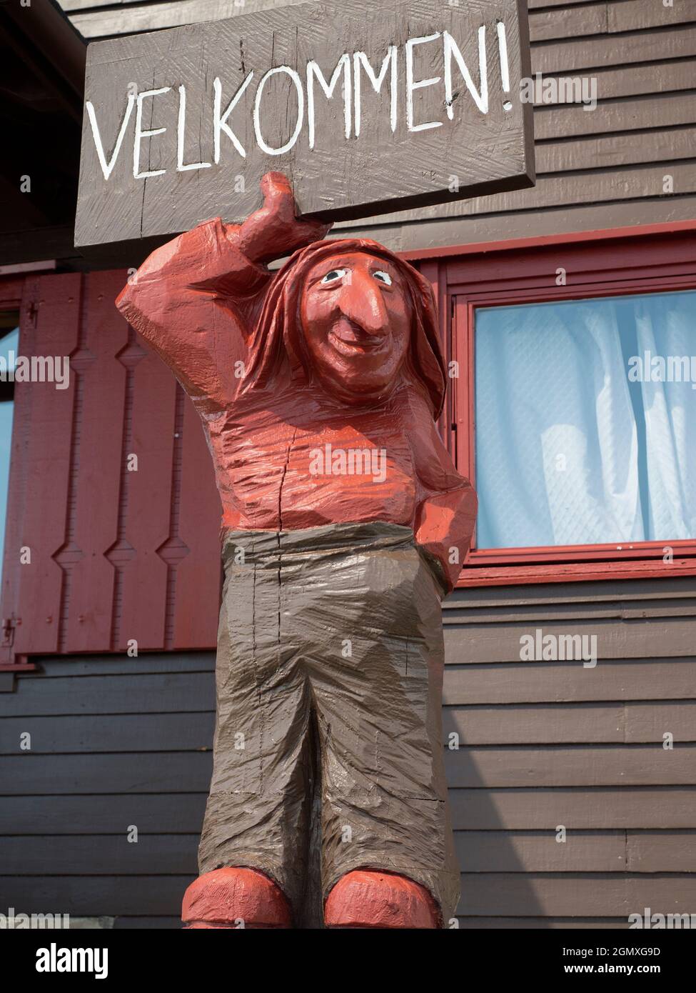 This rather unusual red troll greets visitors at an isolated mountain lodge on the Hardangervidda - Europe's largest mountain plateau - located just i Stock Photo