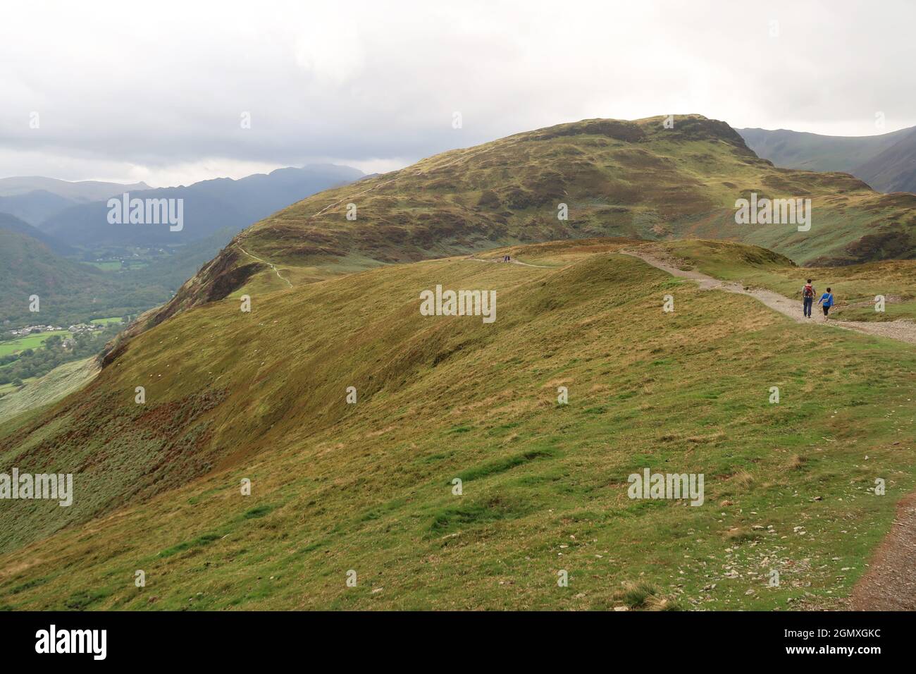 Cat Bells, Lake District, UK. A popular ridge path crowded with walkers on a cloudy September weekend. Stock Photo