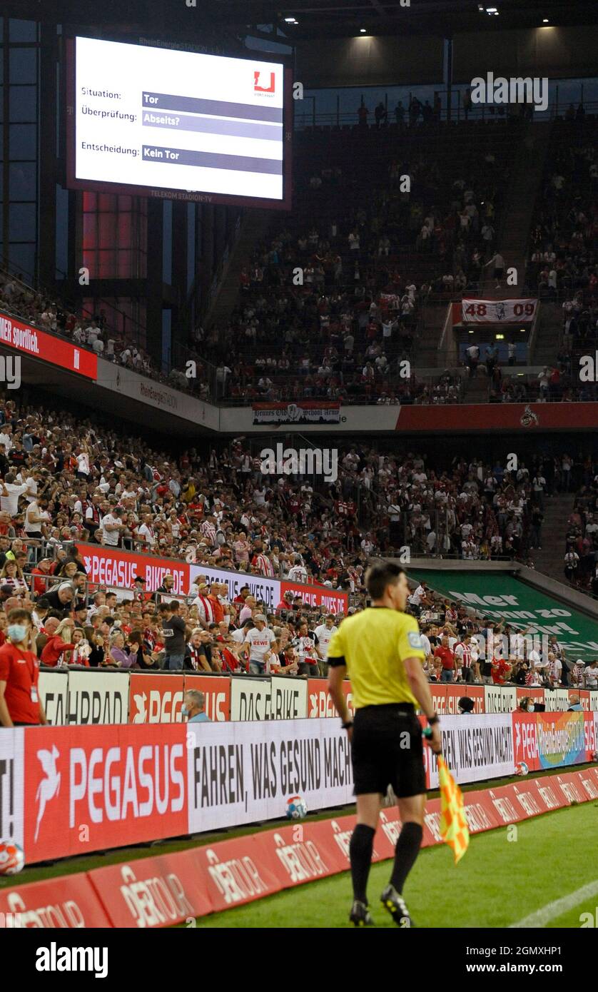 RheinEnergieStadion Cologne Germany,  18.9.2021 Football:  Bundesliga Season 2021/22, matchday 5, 1.FC Koeln (KOE) vs Rasenballsport Leipzig (RBL)  — video assist , in front assistant ref Stefan Lupp  DFL REGULATIONS PROHIBIT ANY USE OF PHOTOGRAPHS AS IMAGE SEQUENCES AND/OR QUASI-VIDEO Stock Photo