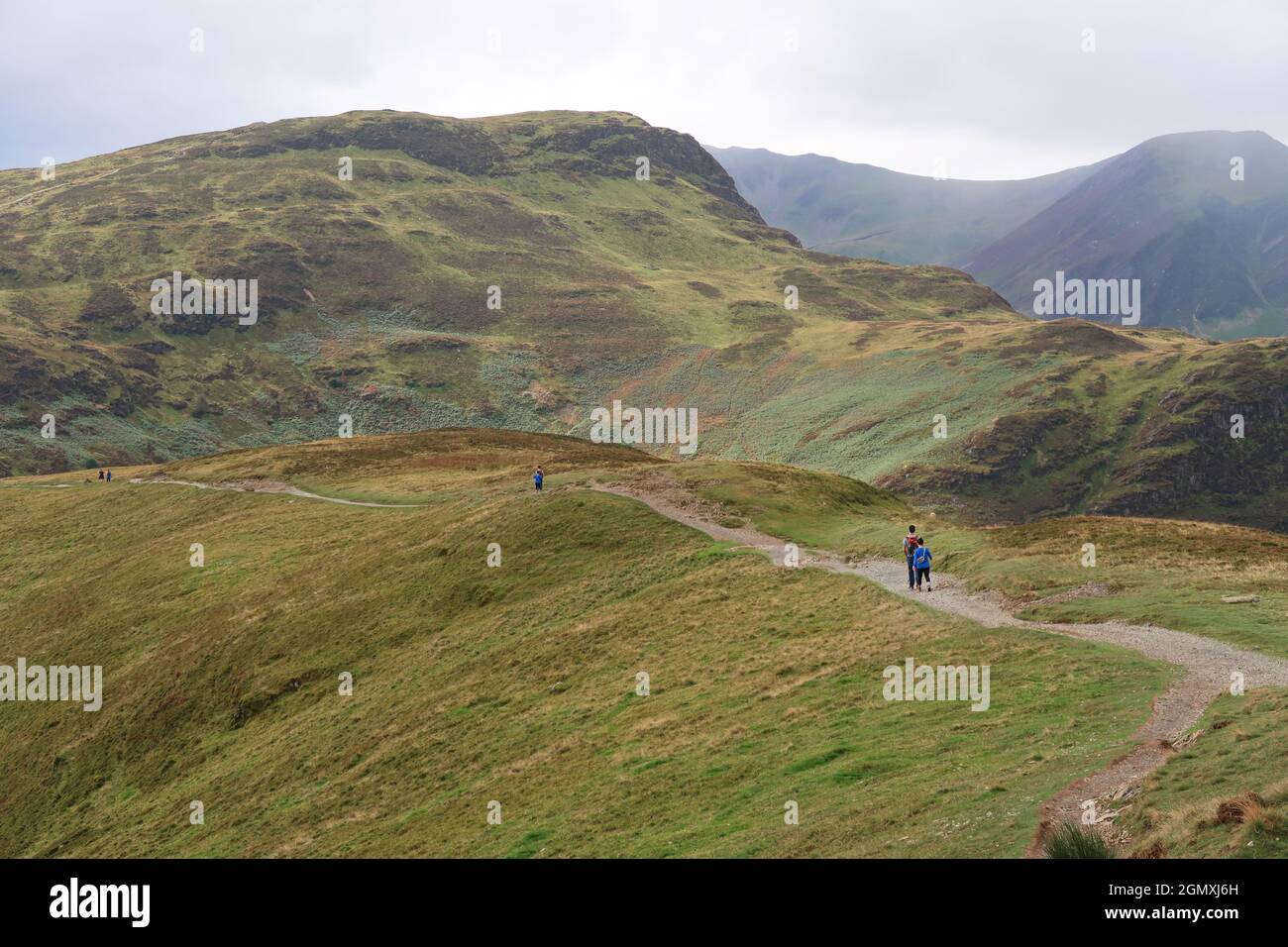 Cat Bells, Lake District, UK. A popular ridge path crowded with walkers ...