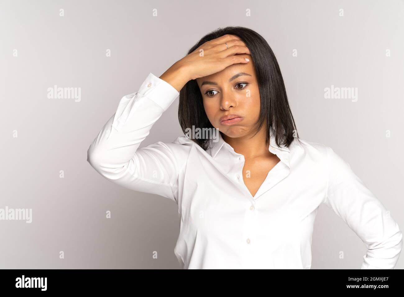 Woman sweaty hand on head Stock Photo by ©alanpoulson 29124997