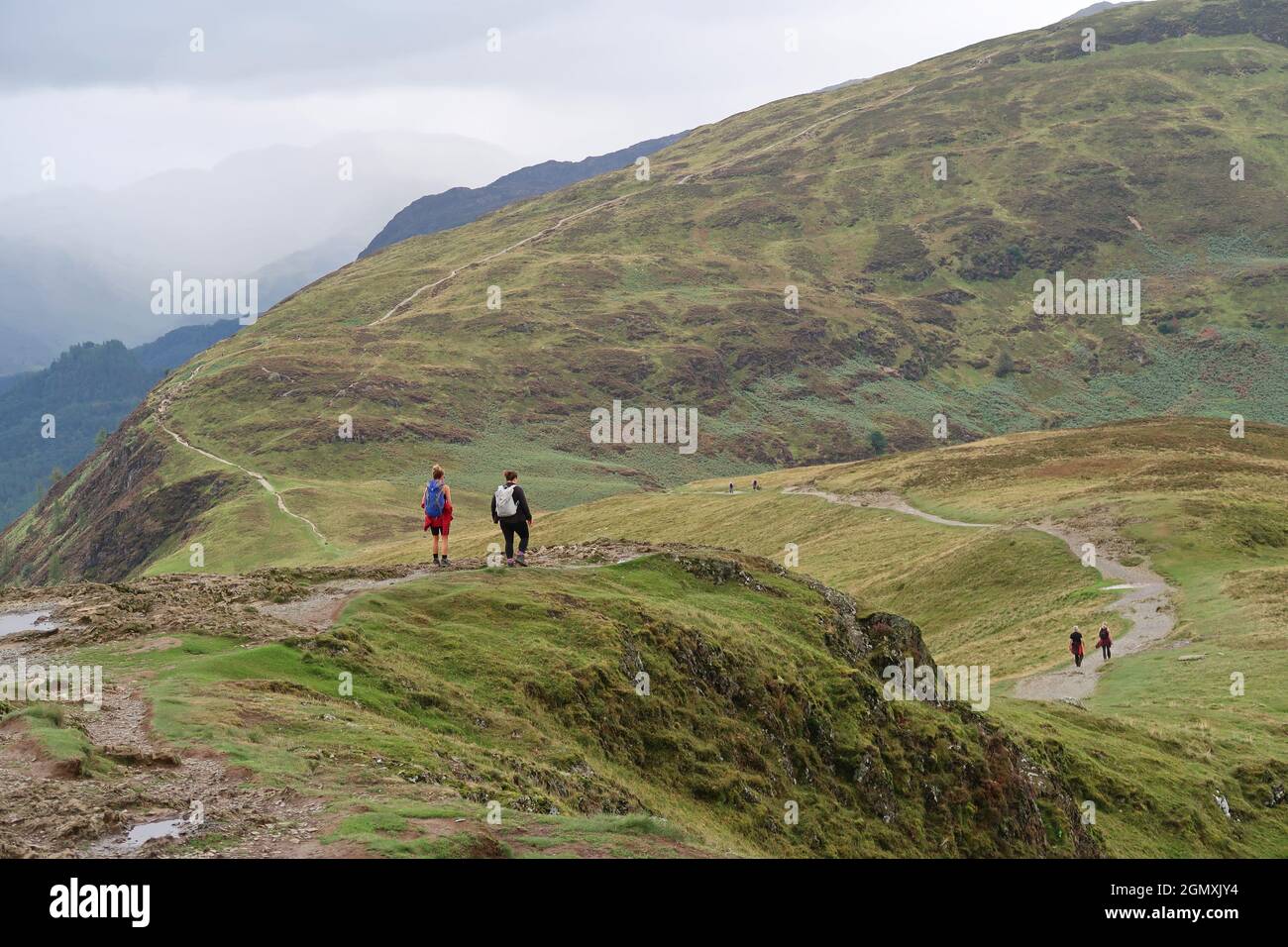 Walkers on Cat Bells, Lake District, UK. A popular ridge path ...