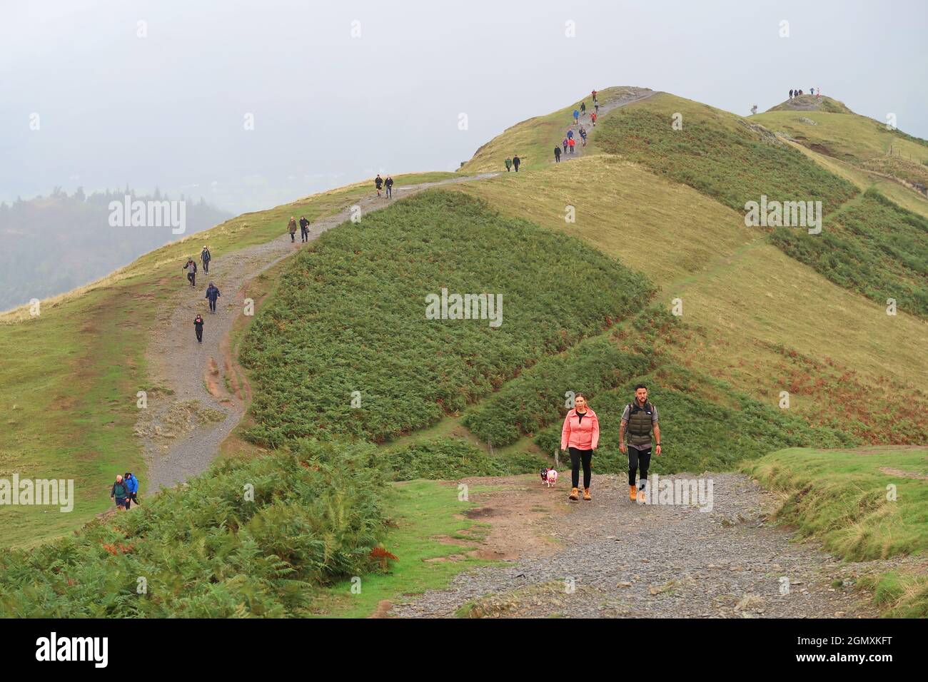 Cat Bells, Lake District, UK. A popular ridge path crowded with walkers ...