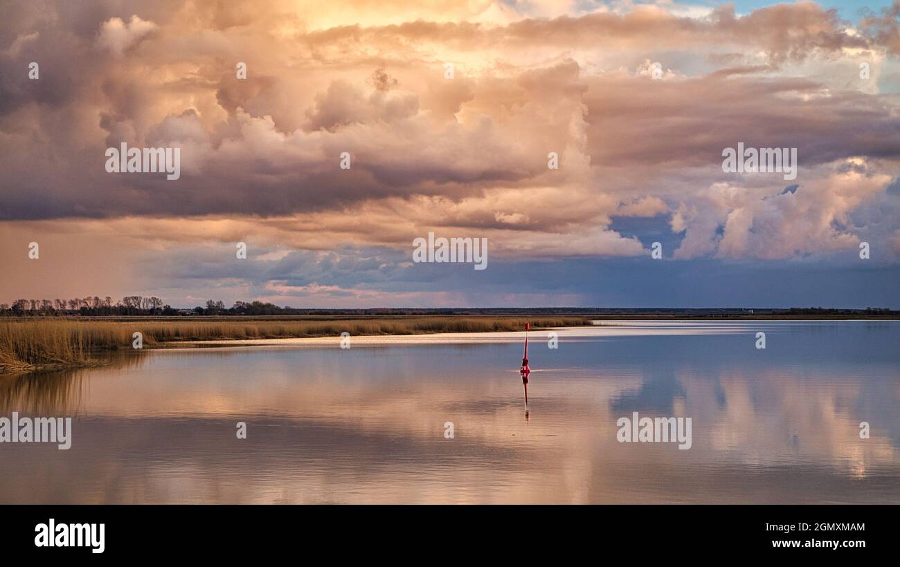 The Bodden landscape of Zingst with dramatic sky and reflection in the water. colorful sight. a beautiful vacation place Stock Photo