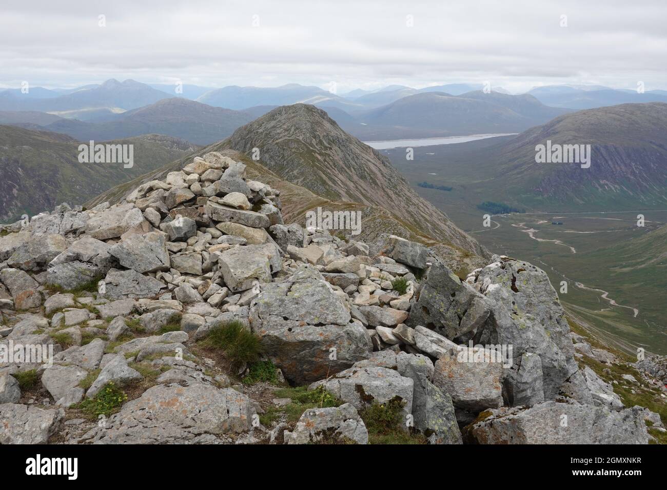 View from summit of Munro, Stob Dubh, Buachaille Etive Beag looking towards Loch Etive in distance, Glen Coe, Scottish Highlands Stock Photo