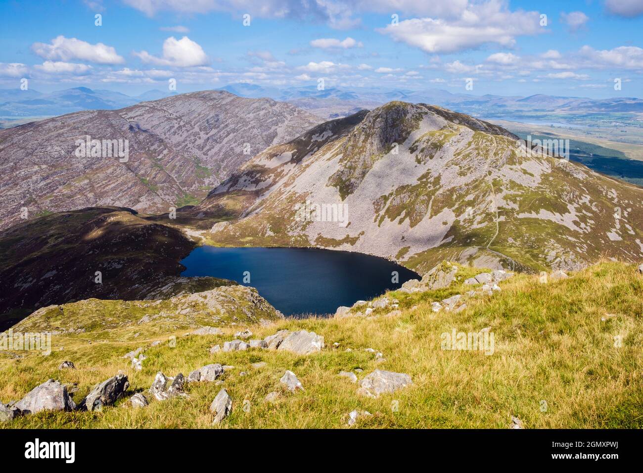 Llyn Hywel below Rhinog Fach from Y Llethr with Rhinog Fawr beyond in southern Snowdonia National Park in summer. Nantcol, Gwynedd, north Wales, UK Stock Photo