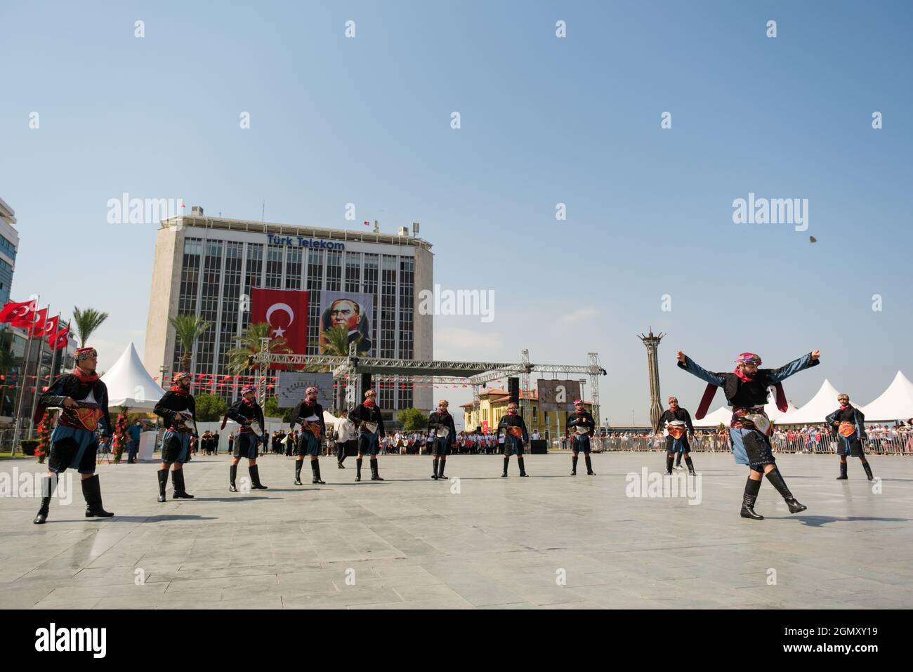 Izmir, Turkey - September 9, 2021: People performing Zeybek dance on the liberty day of Izmir at the Republic Square in Izmir. Stock Photo