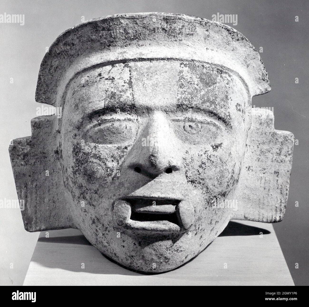 Deity Head. Date: 13th-15th century; Geography: Mexico, Mesoamerica, Oaxaca; Culture: Eastern Nahua; Medium: Ceramic; Dimensions: H. 7 7/16 x W. 9 Stock Photo