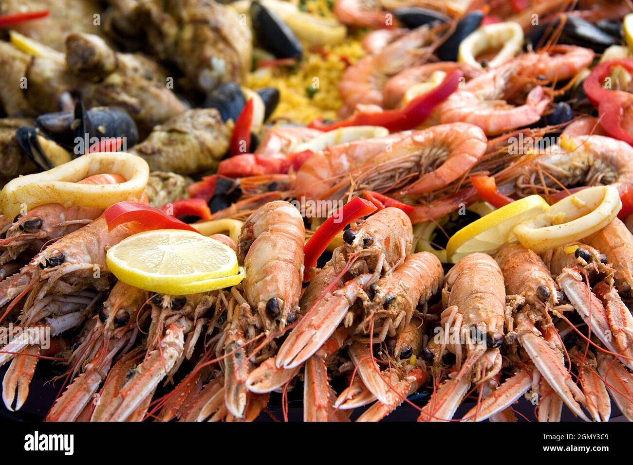 Fresh cooked paella for sale at a street market Stock Photo Alamy