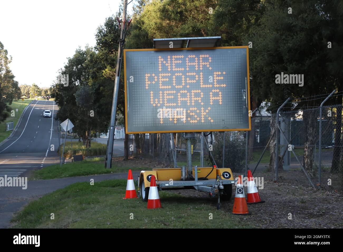 Sydney, Australia. 21st September 2021. Covid road sign on Jamieson Street, Sydney Olympic Park. Credit: Richard Milnes/Alamy Live News Stock Photo