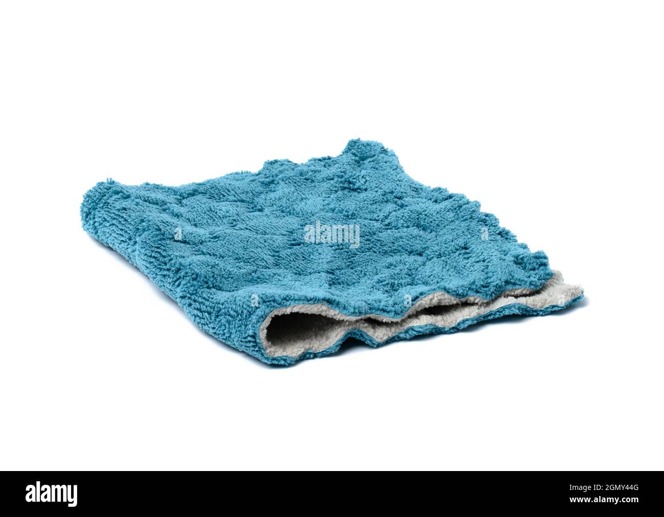 folded kitchen blue towel isolated on white background. Terry cloth Stock Photo