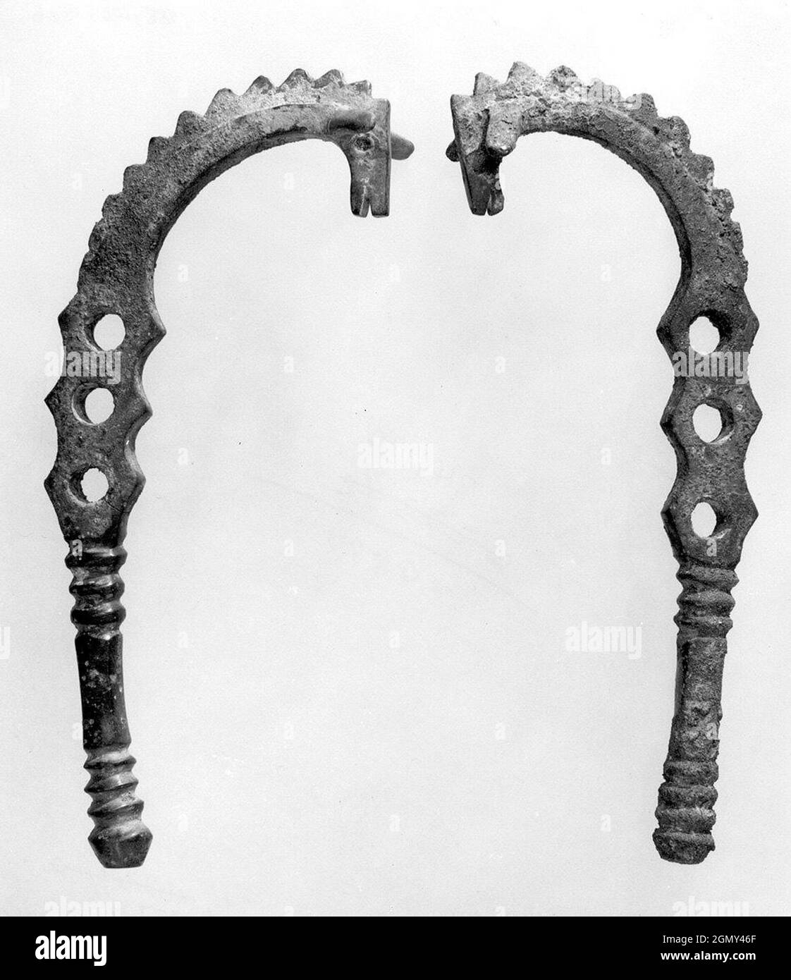 Horse bit cheekpieces in form of a horse with spiked mane. Period Iron