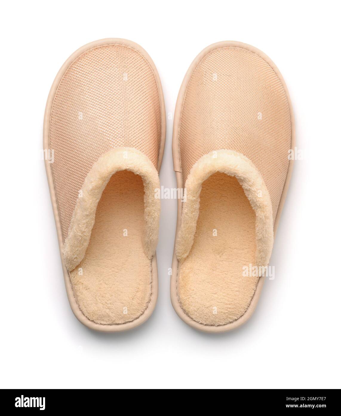 Top view of soft beige home slippers isolated on white Stock Photo