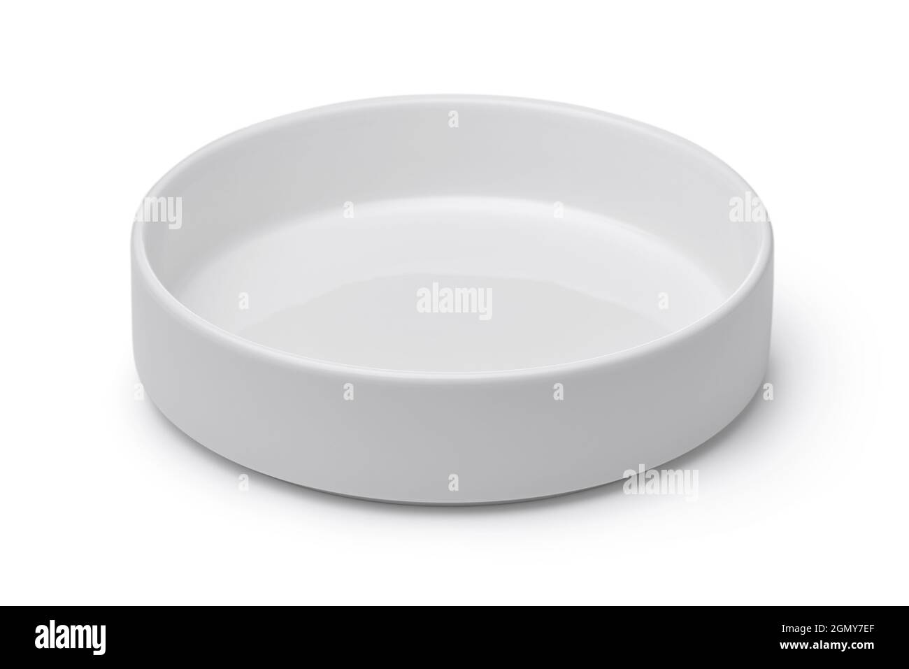 Empty white cylindrical ceramic bowl isolated on white Stock Photo