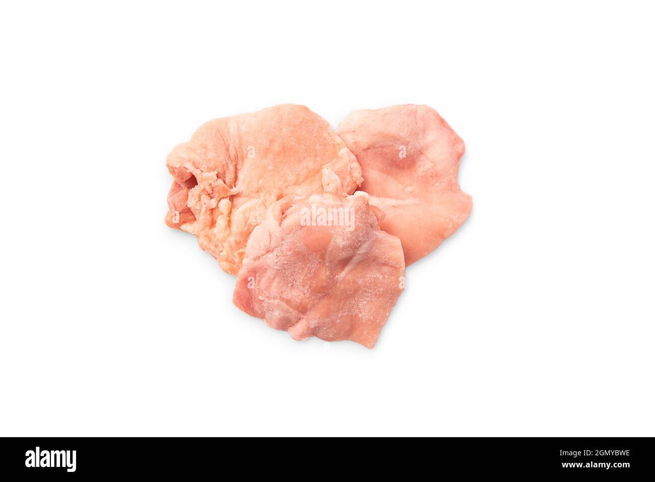 Raw Frozen Skinless boneless Chicken Thigh.Raw chicken thighs on white
