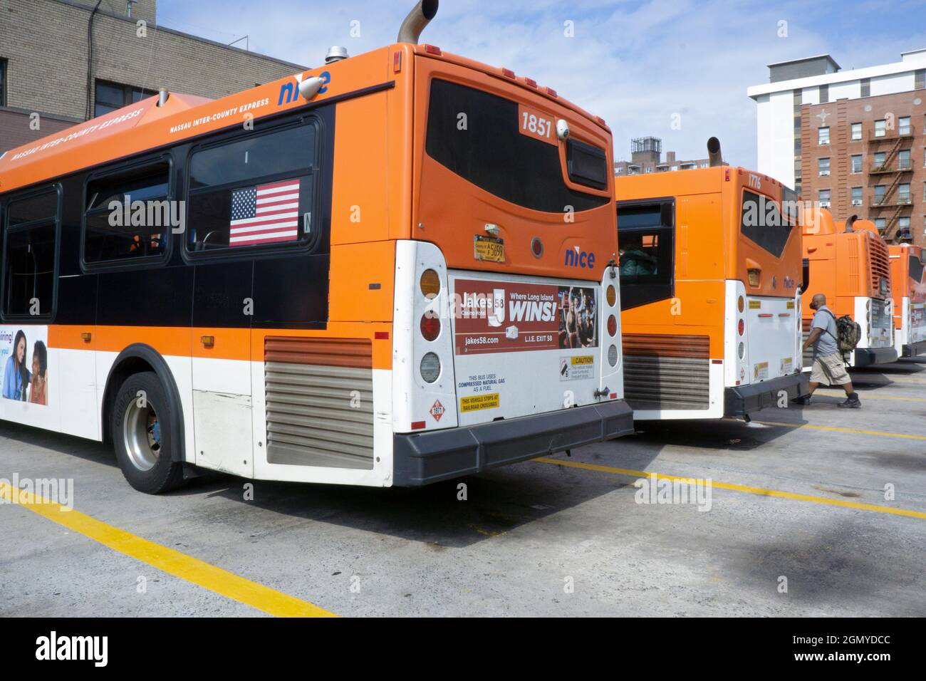 Nassau Inter-County Express buses parked in the 165th Street Terminal on Merrick Blvd. in Jamaica, Queens, New York City. Stock Photo