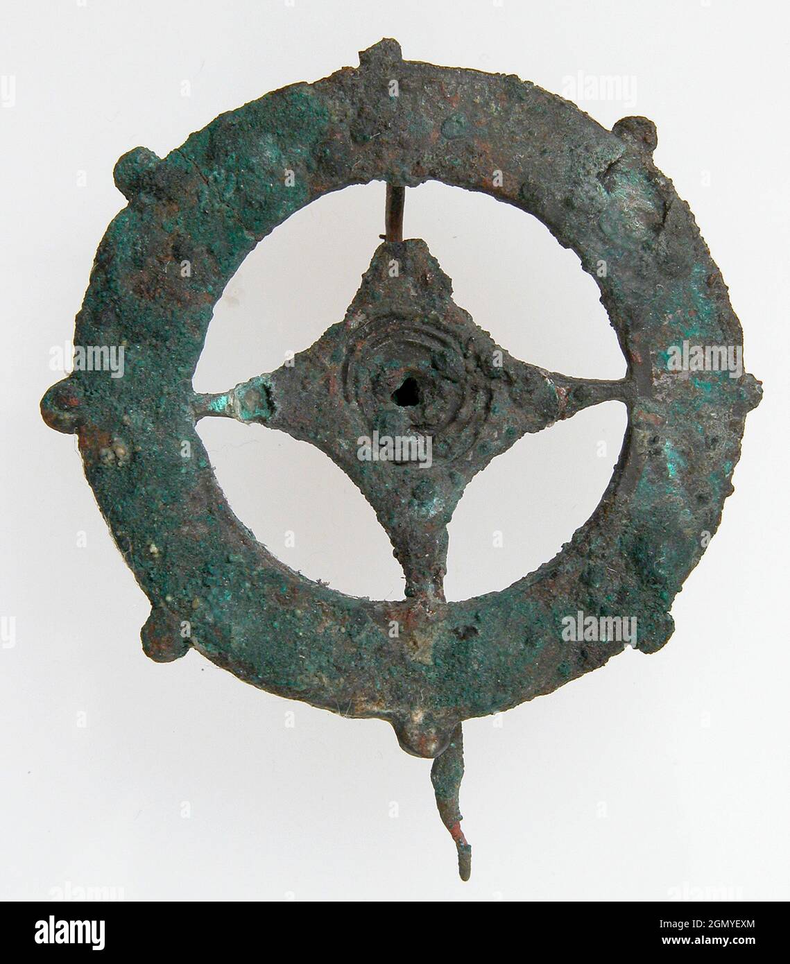 Brooch. Date: 100-300; Culture: Roman; Medium: Champlevé enamel, bronze; Dimensions: Overall: 1 13/16 x 1 1/2 x 1/4 in. (4.6 x 3.8 x 0.7 cm); Stock Photo