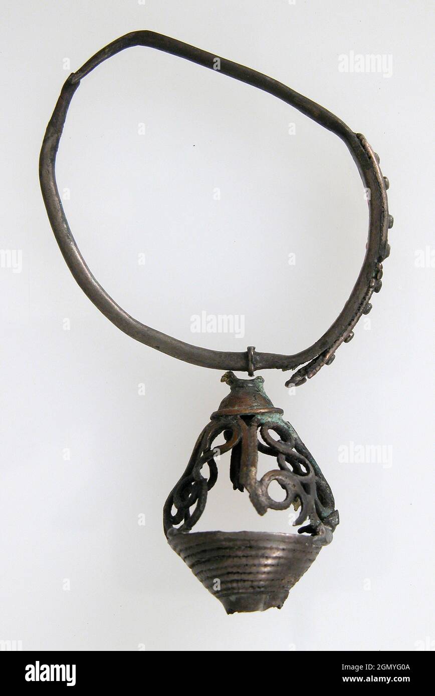 Earring. Date: 8th-9th century; Culture: Avar; Medium: Silver; Dimensions: Overall (hoop): 1 9/16 x 1 1/4 x 3/16 in. (4 x 3.2 x 0.5 cm); Stock Photo