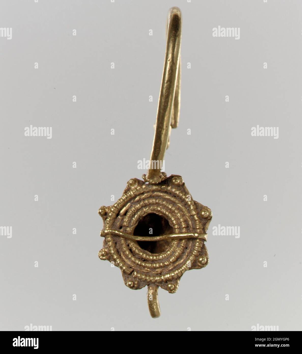 Earring. Date: 6th-7th century; Geography: Made in Italy; Culture: Langobardic or Byzantine (?); Medium: Gold; Dimensions: 1 13/16 x 11/16 x 7/8 in. Stock Photo