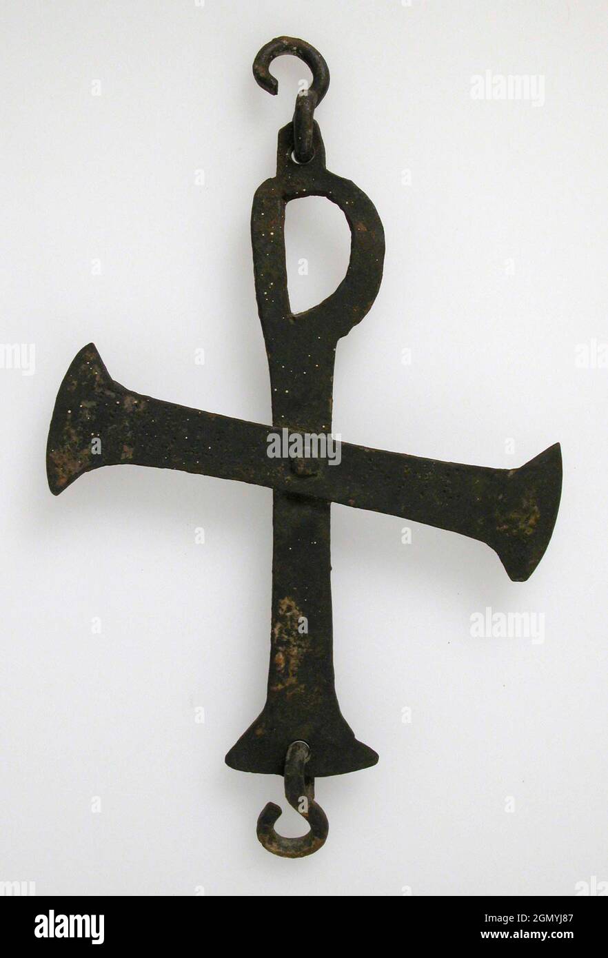 Cross. Date: 6th century or later; Culture: Byzantine; Medium: Cast copper alloy; Dimensions: Overall: 9 1/2 x 6 x 11/16 in. (24.1 x 15.2 x 1.8 cm); Stock Photo