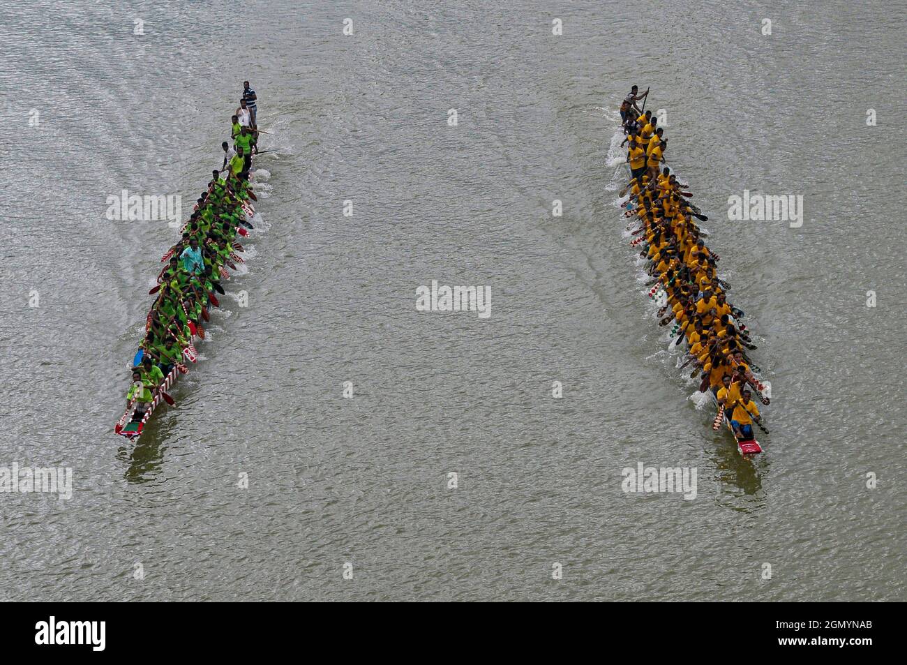 The traditional Bangladeshi Boat race contest on the Chenger Khal river in the Badaghat area of Sadar upazila, Sylhet, Bangladesh. Stock Photo