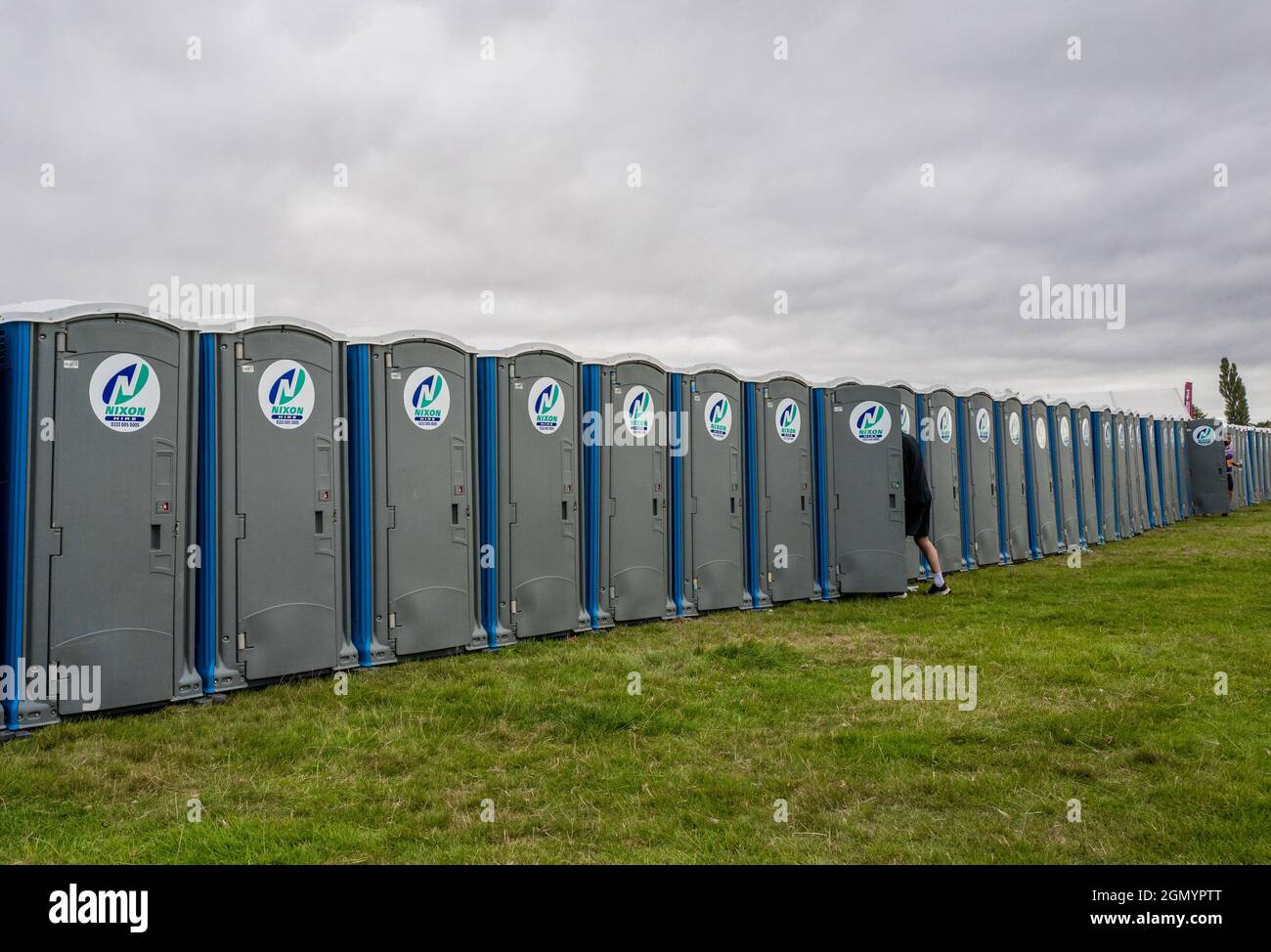 Long line of portable toilets at the Great North Run 2021 for runners and spectators. Stock Photo