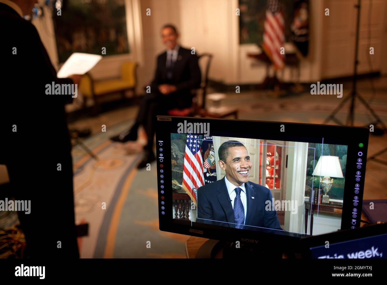 President Barack Obama tapes the weekly address in the Diplomatic Room of the White House, May 29, 2009.   (Official White House Photo by Lawrence Jackson) This official White House photograph is being made available for publication by news organizations and/or for personal use printing by the subject(s) of the photograph. The photograph may not be manipulated in any way or used in materials, advertisements, products, or promotions that in any way suggest approval or endorsement of the President, the First Family, or the White House. Stock Photo