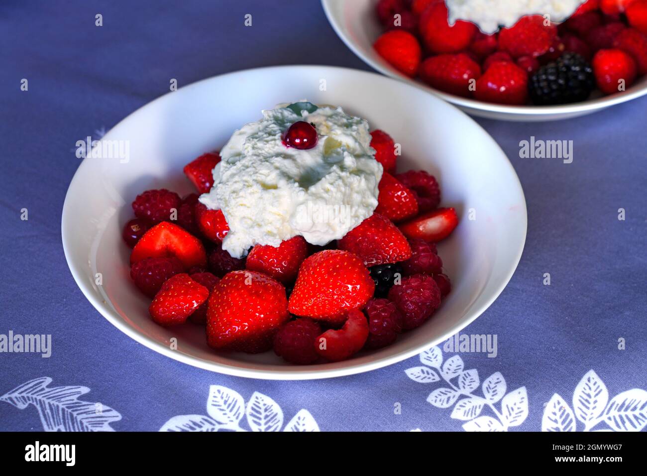 Fresh berries with Fontainebleau whipped cream cheese Stock Photo Alamy