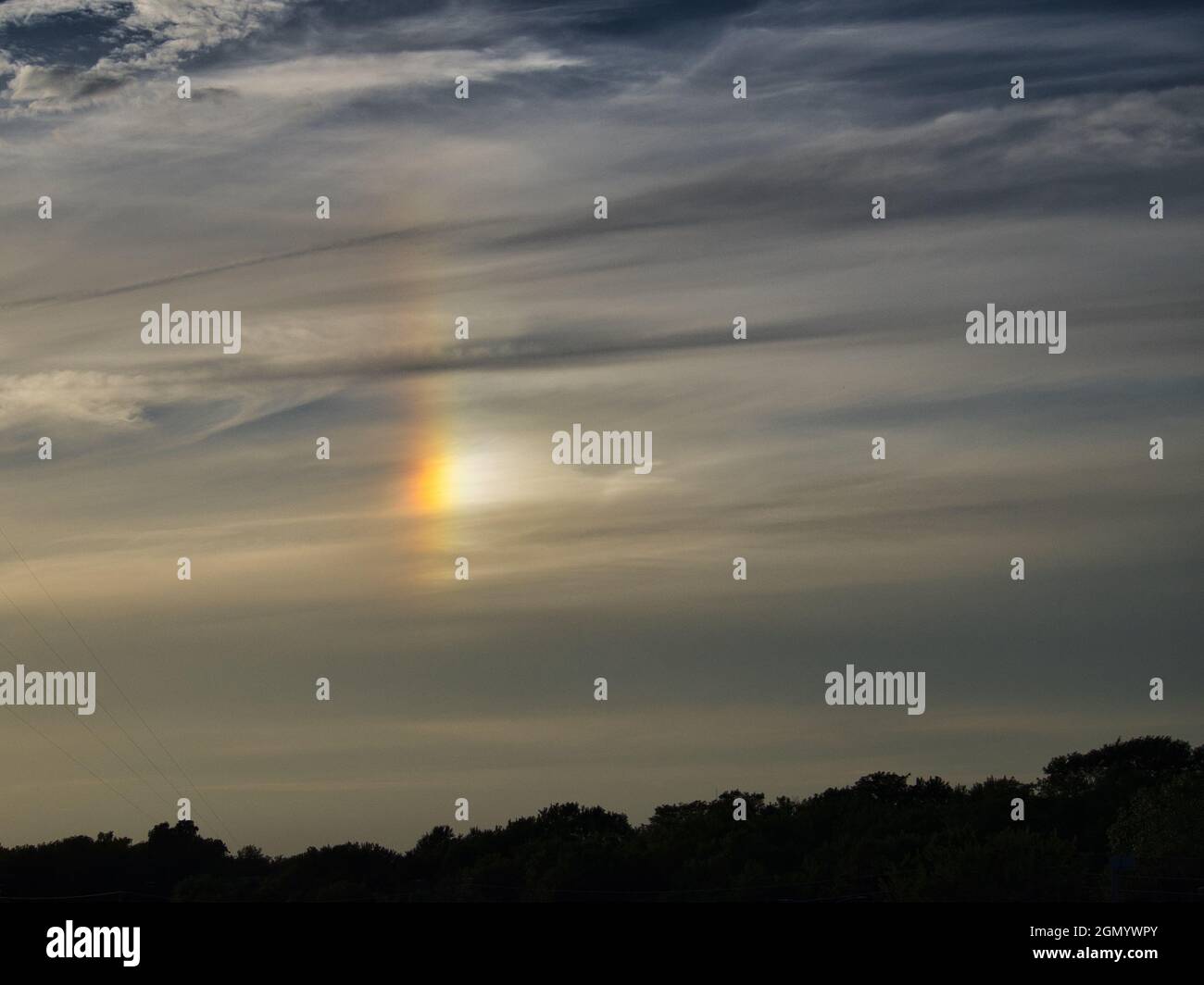 Beautiful sky with a rainbow and clouds Stock Photo - Alamy