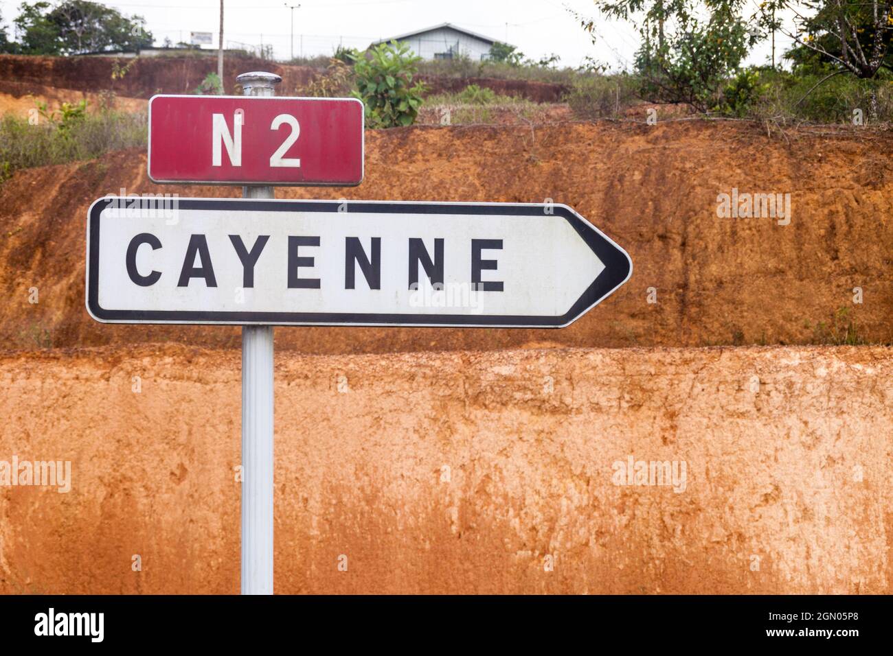 Roadsign (located in Saint-Georges) pointing to Cayenne, French Guiana Stock Photo