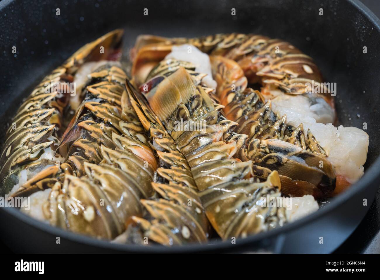 Surf and turf grilled fillet steak and crawfish Stock Photo - Alamy