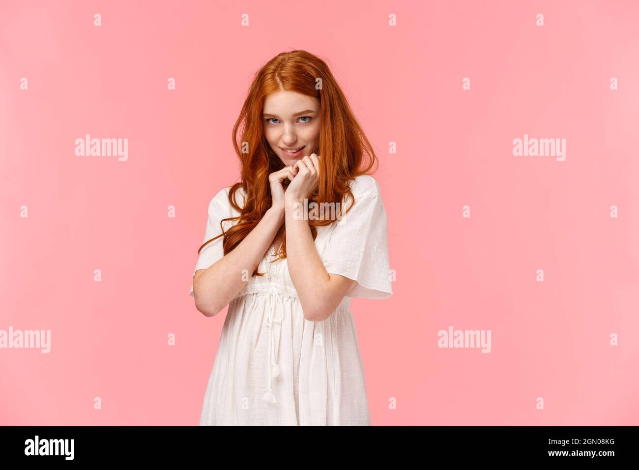 Relationship, seduction and love concept. Cute kawaii young redhead woman  in white dress, acting silly and lovely, squirm on floor and looking  coquett Stock Photo - Alamy