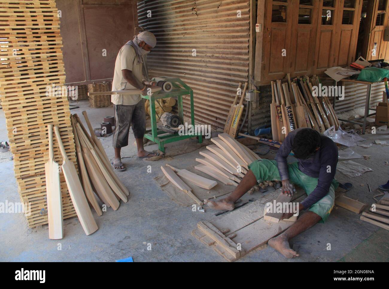 A worker produce cricket bats in a factory on September 19, 2021 in