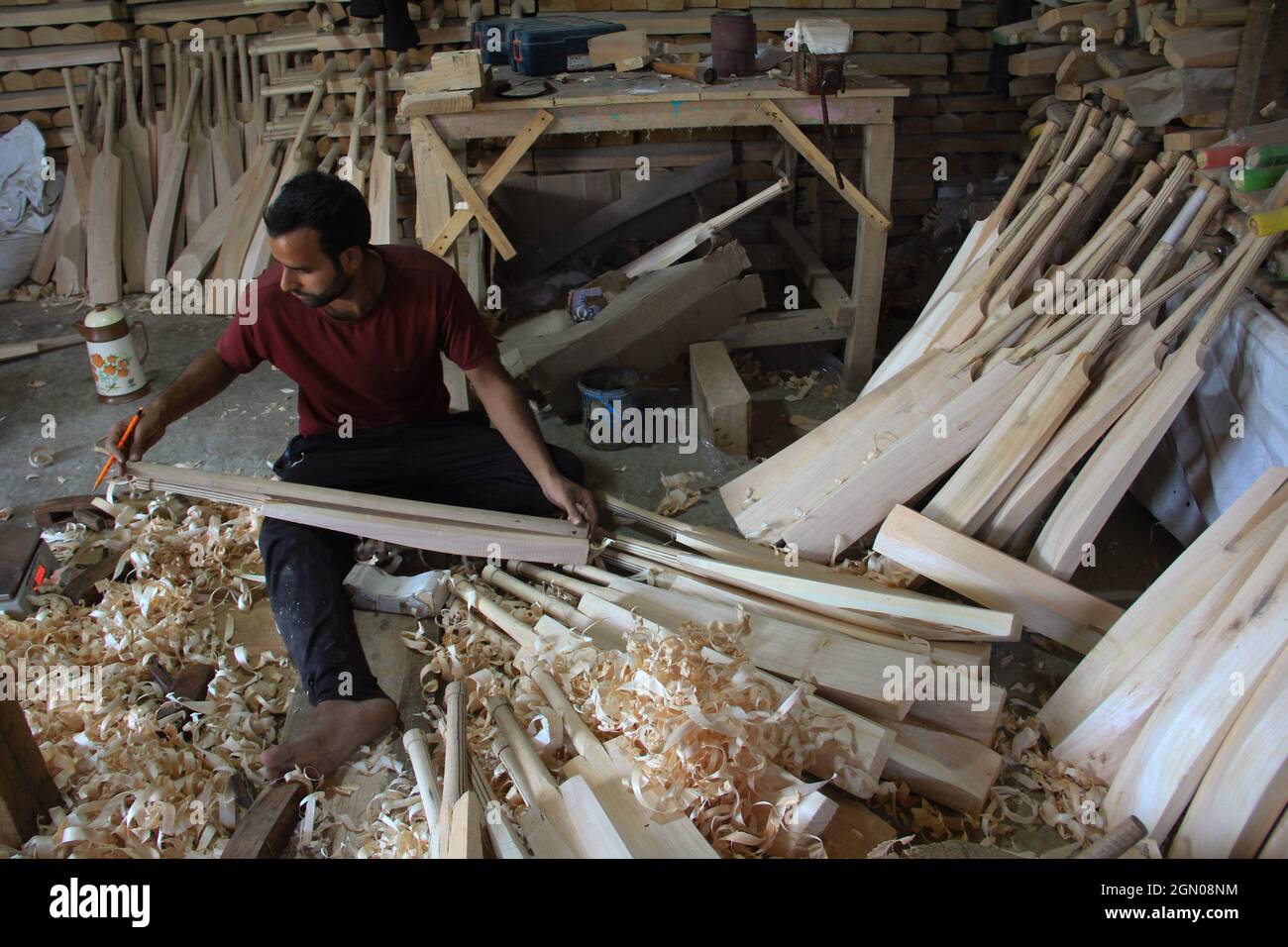 A worker produce cricket bats in a factory on September 19, 2021 in