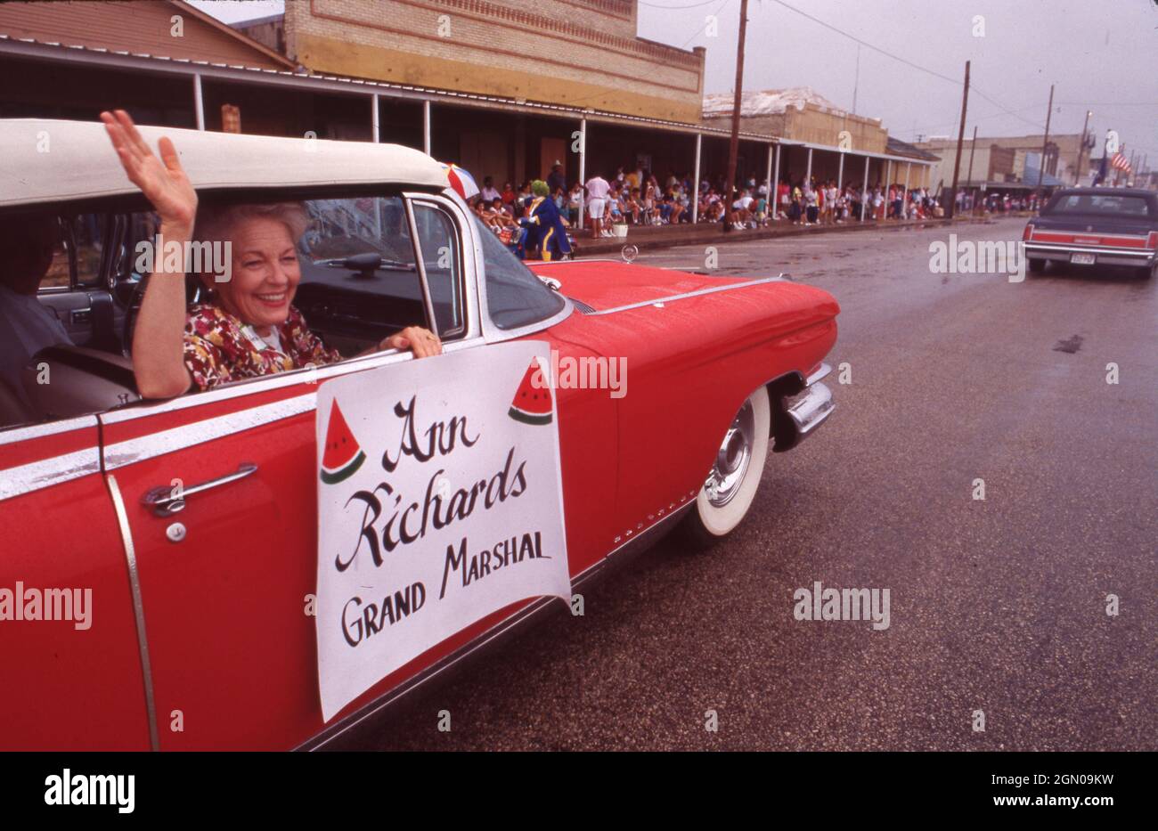 Luling Texas USA, circa 1993 Texas Governor ANN RICHARDS waves to the crowd as grand marshal of