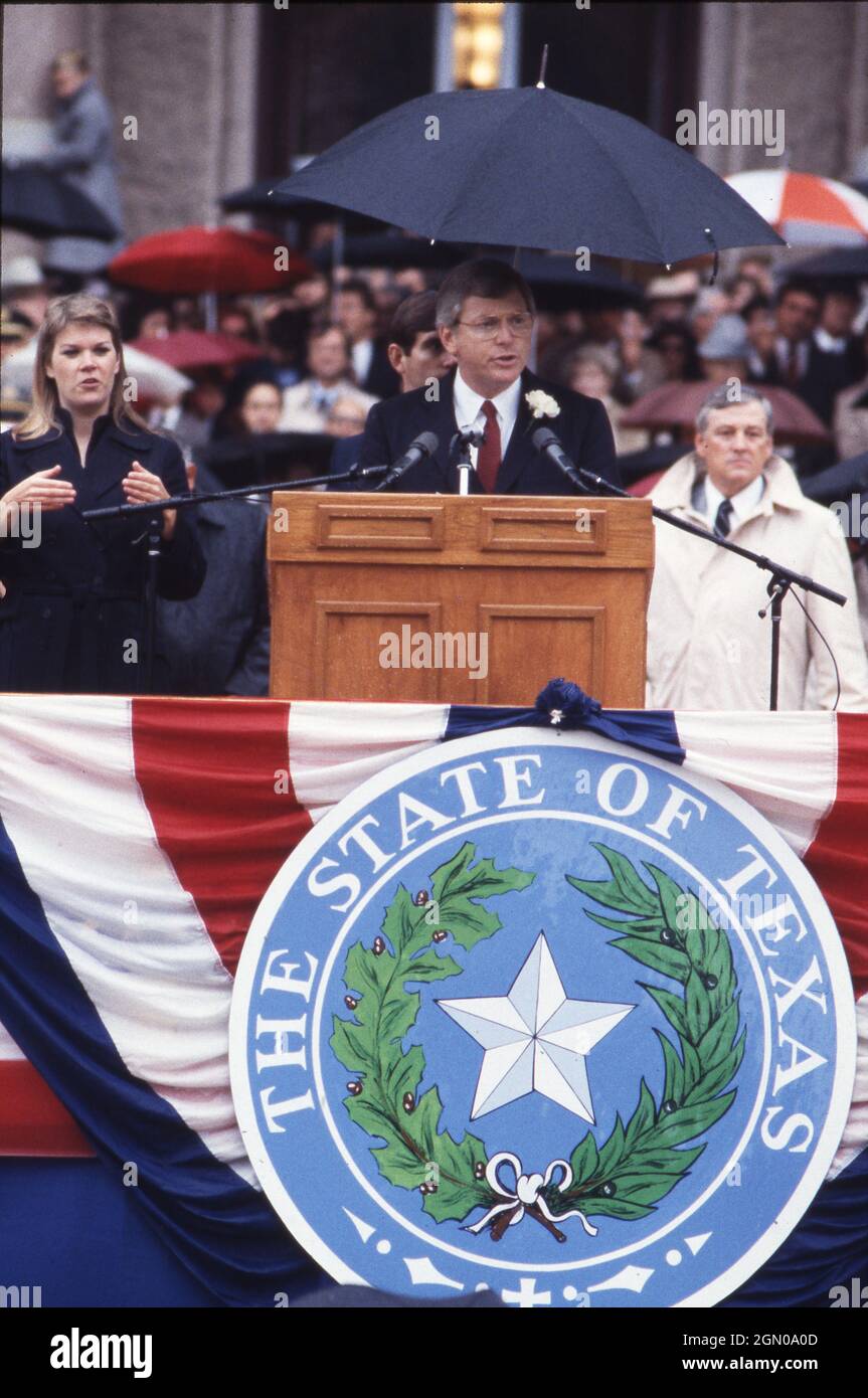 austin-texas-usa-jan-18-1983-democratic-texas-governor-mark-white-speaks-during-his-inauguration-ceremony-at-the-capitol-on-a-rainy-winter-day-bob-dammerich-2GN0A0D.jpg