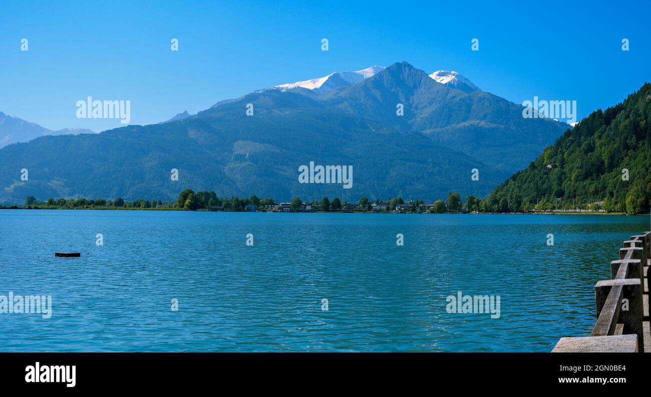 view to the south coast of the Zeller lake with the foothills of the High Tauern in the region Pinzgau at Salzburg, Austria Stock Photo