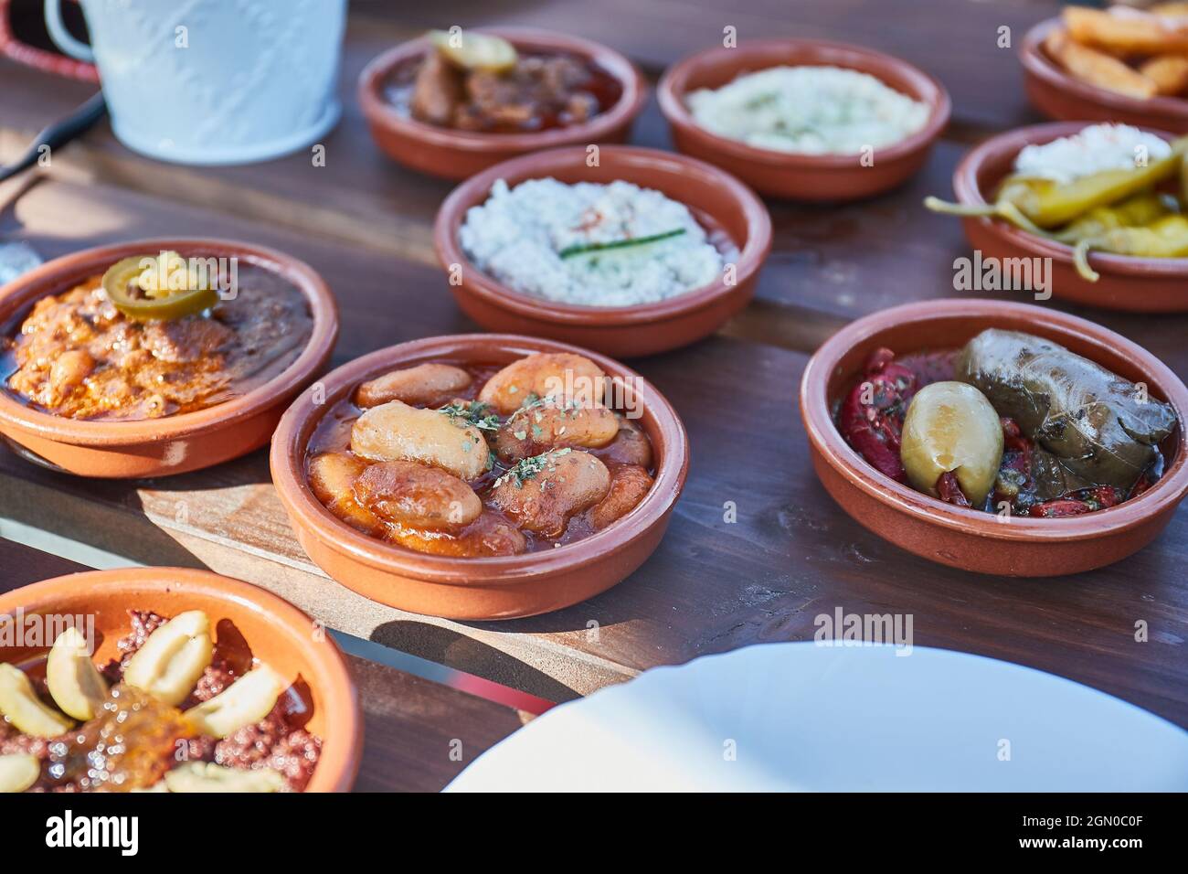 Tapas served in many small plates Stock Photo